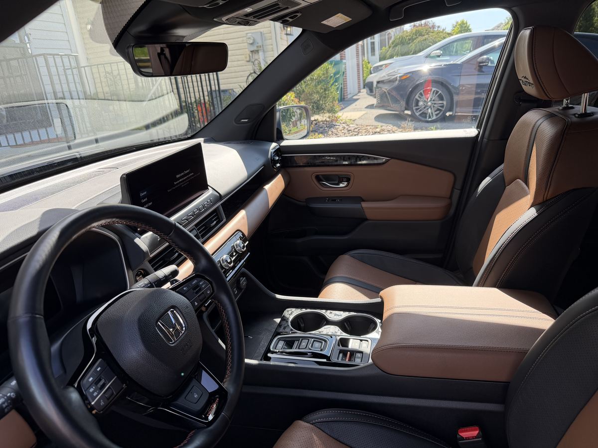 Honda Passport dashboard, steering wheel and center console after an interior detail